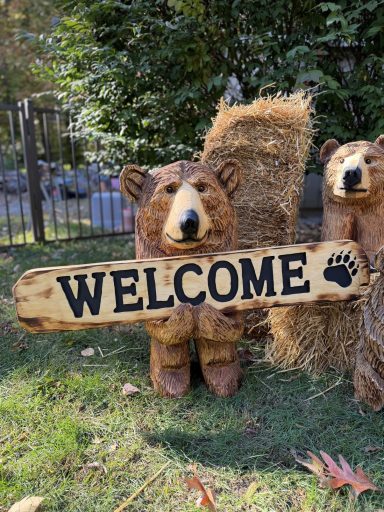 Taller sign bear with bigger reversible Welcome Go Away sign, natural varnish